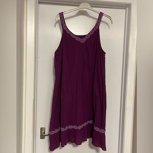 Pennington’s purple sleeveless dress